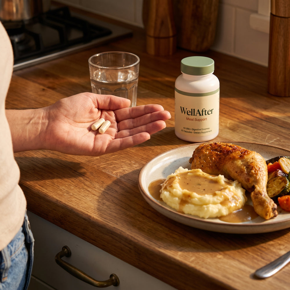 Two WellAfter capsules next to a roast chicken dinner